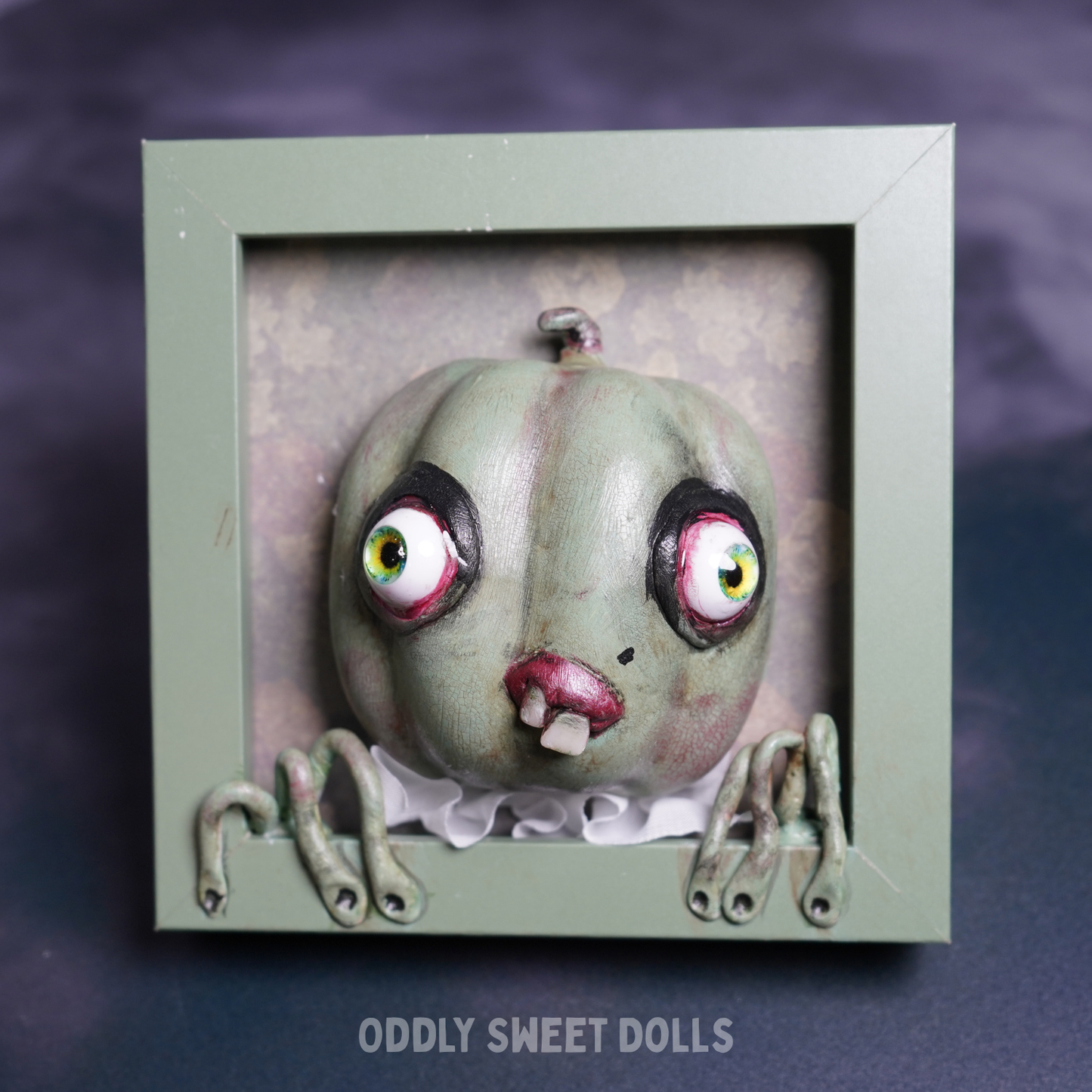 FRAMED PUMPKIN with big eyes and teeth
