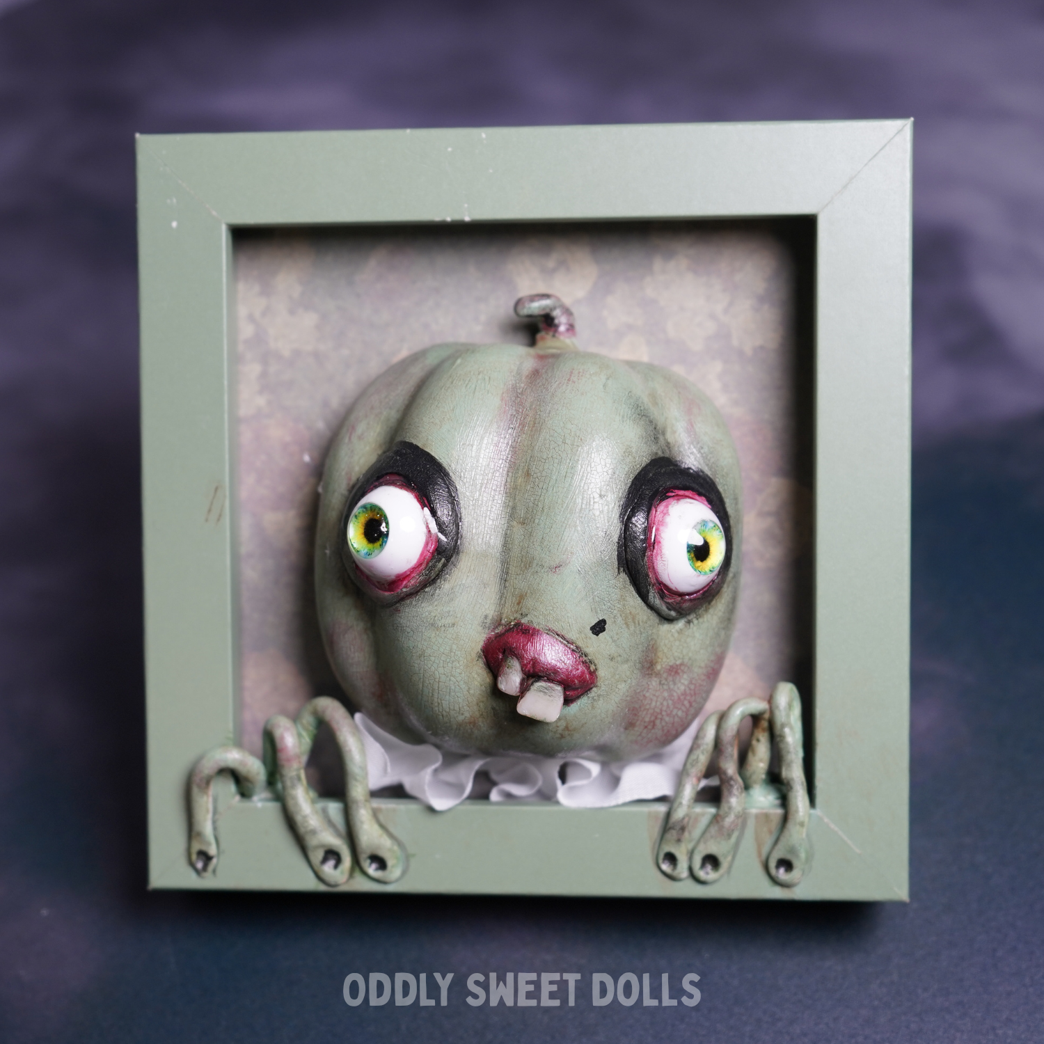 FRAMED PUMPKIN with big eyes and teeth