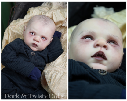 A split-screen close-up of a realistic baby doll wearing a dark ribbed knit outfit, with textured beige fabric in the background. The left panel shows the doll lying down, and the right panel is a tighter close-up of the face.