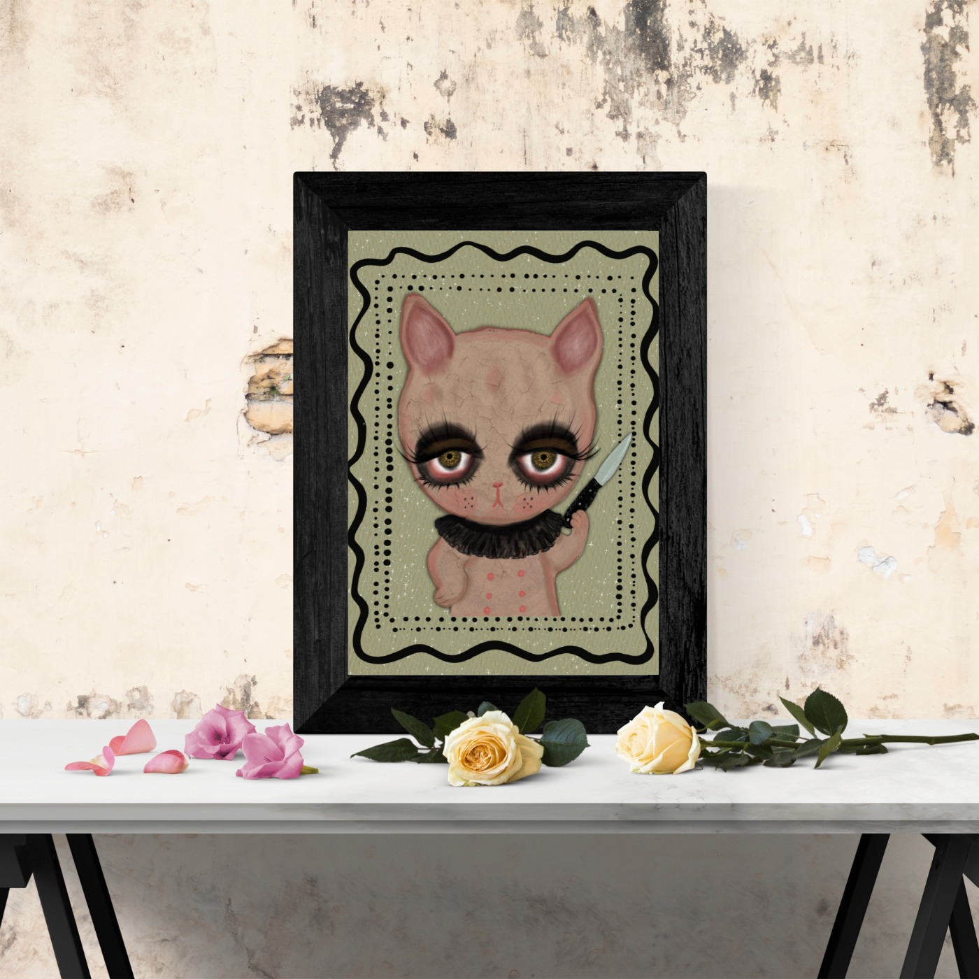 bunny holding a knife with a green background in a black frame on a table top