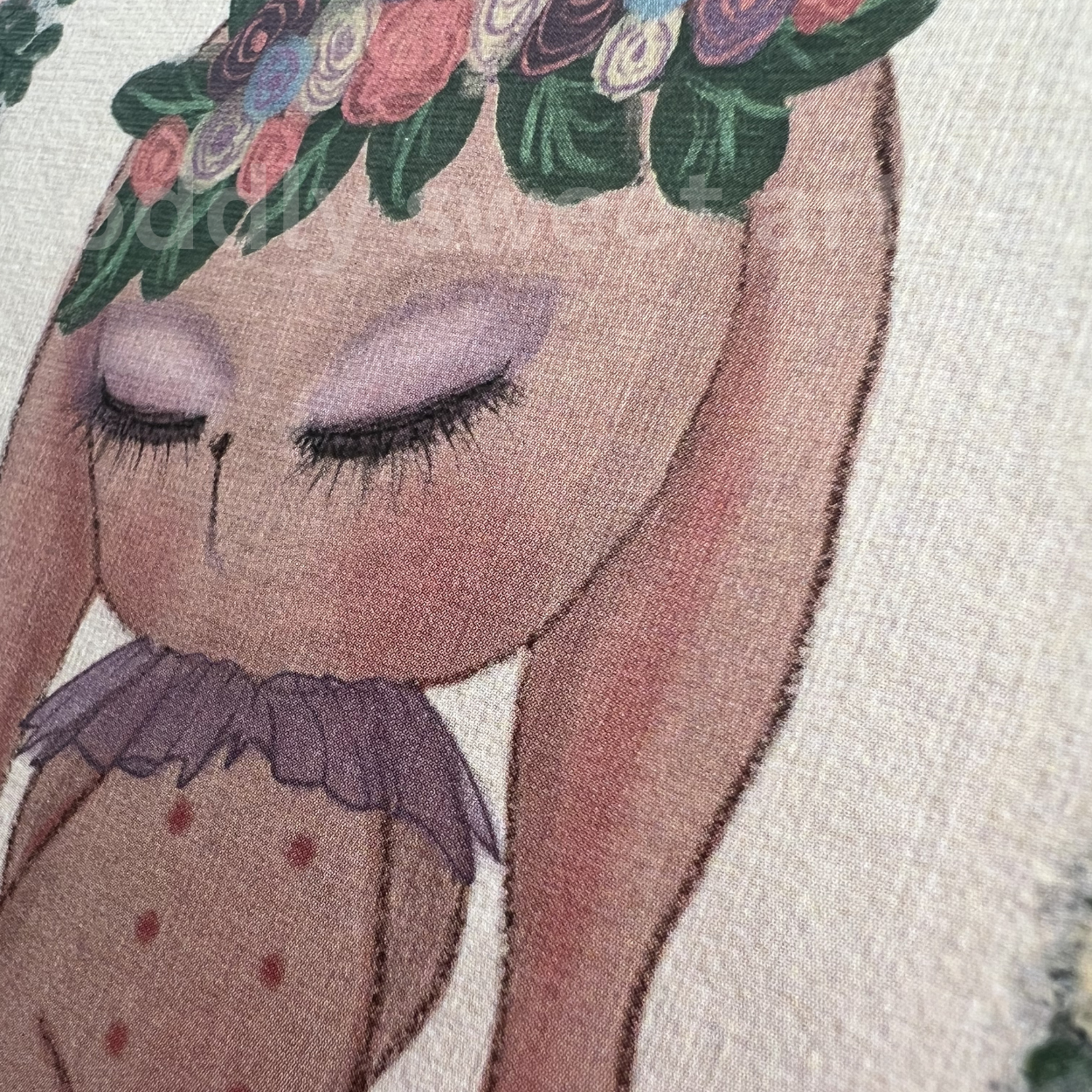 Illustration of a bunny with a flower crown on a textured fabric background