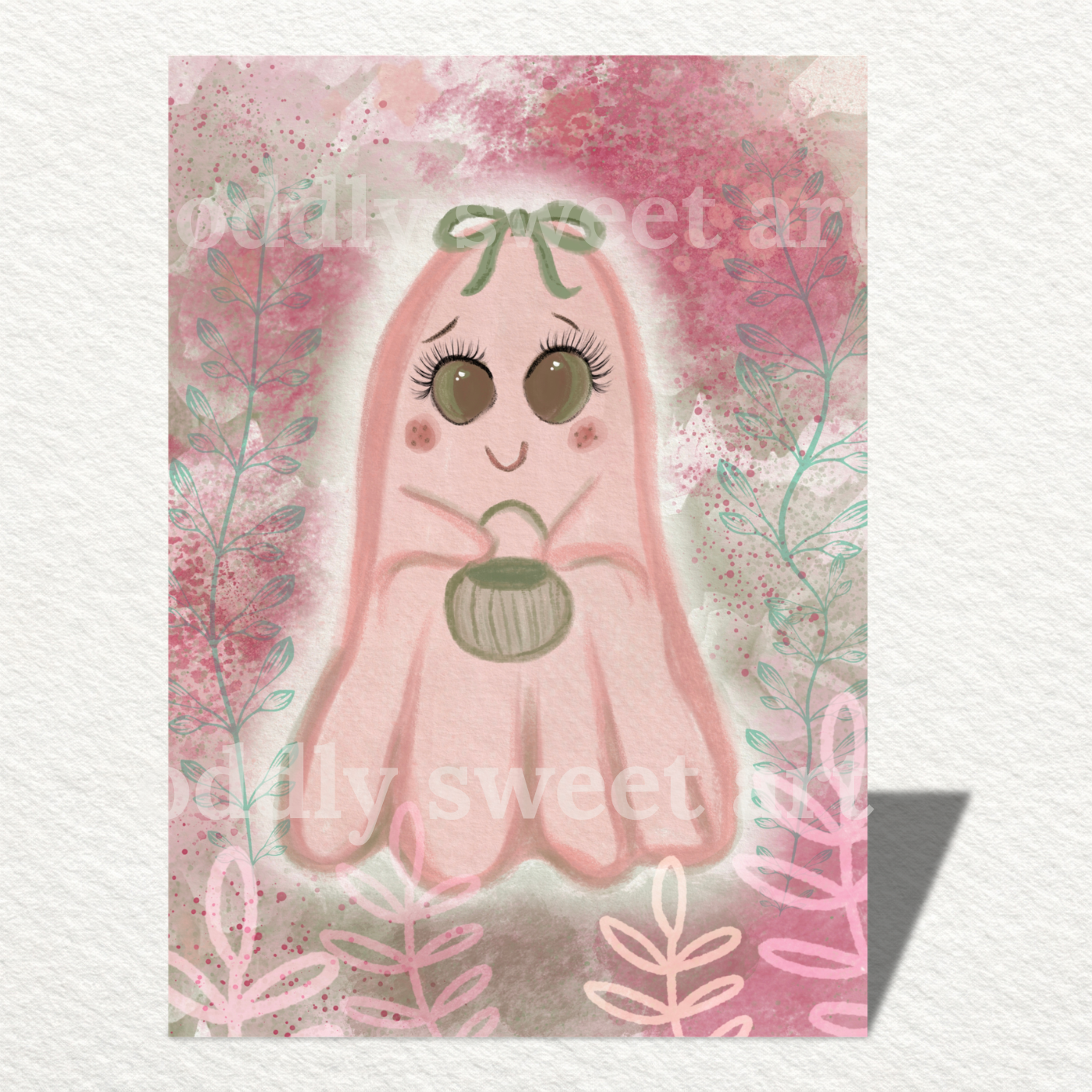 pink ghost holding a green candy bucket with flowers design