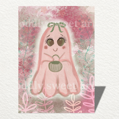 pink ghost holding a green candy bucket with flowers design