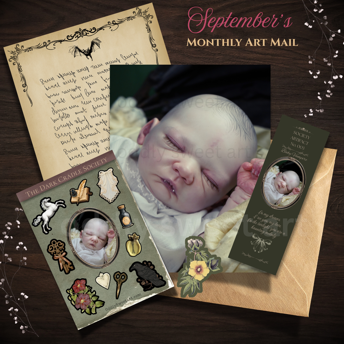 September dark cradle societys package with a reborn vampire baby, sticker, bookmark, studio letter. 