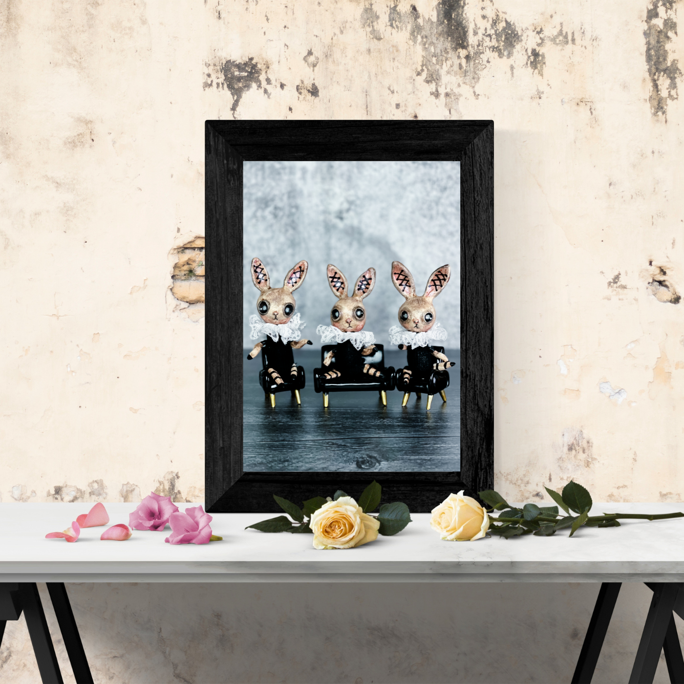 black and blue postcard framed on a table top