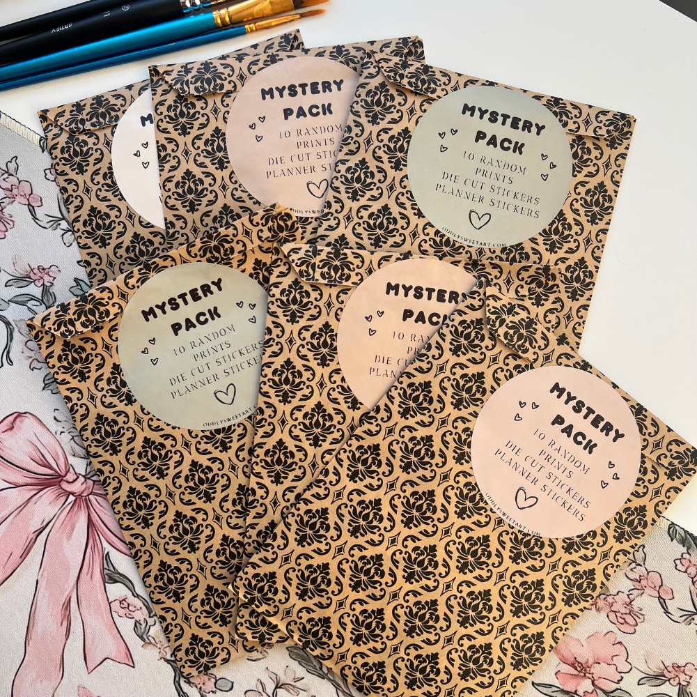 Patterned packaging with 'Mystery Pack' labels on a floral background